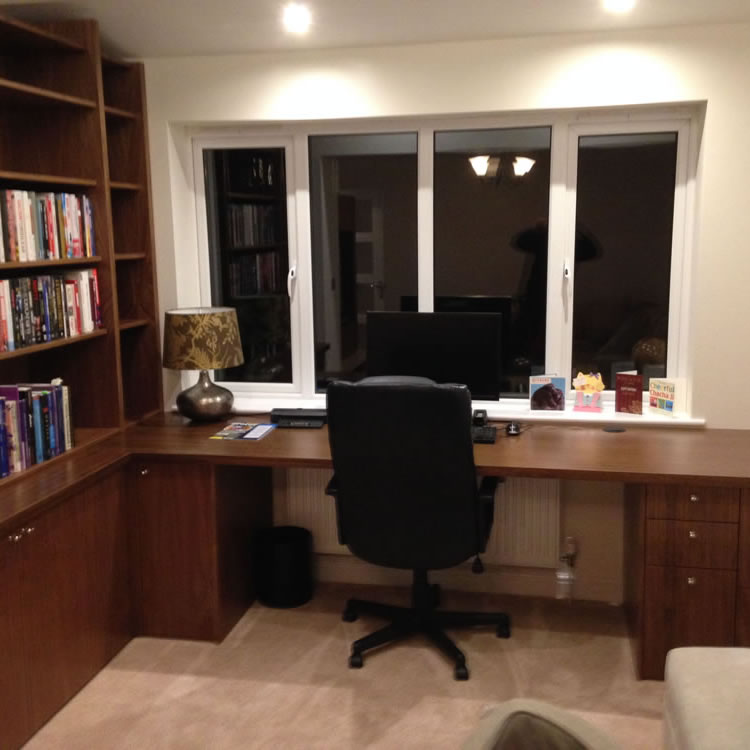 bespoke carpentry bookshelf and desk installation