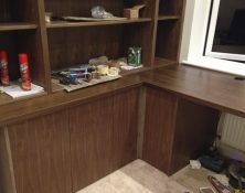 bespoke carpentry bookshelf and desk installation