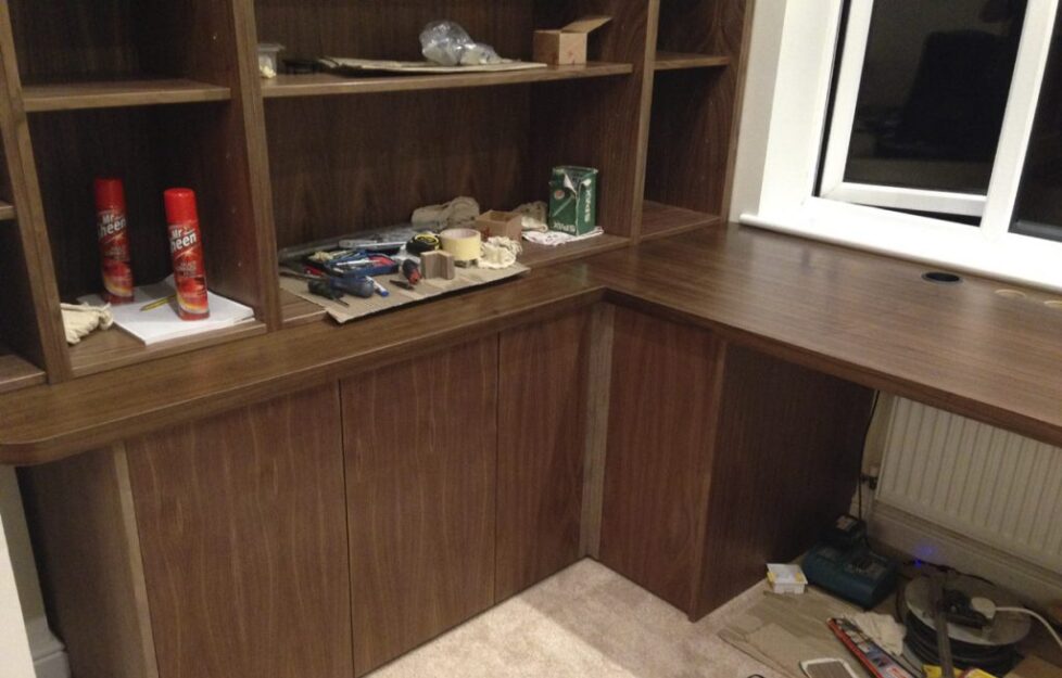 bespoke carpentry bookshelf and desk installation